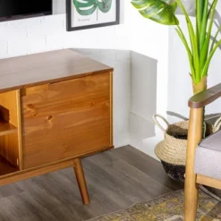 Solid Wood Mid-Century Modern TV Stand For TVs Up To 65" - Saracina Home 17 Solid Wood Mid-Century Modern TV Stand For TVs Up To 65" - Saracina Home -Living Space Shop GUEST 64291693 f8bf 4214 8739 2fe9a7cbadf0