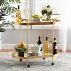 Kamal Glam Brushed Metal And Mirrored Glass 2 Tier Mobile Wine Bar Cart Gold - Baxton Studio 29 Kamal Glam Brushed Metal And Mirrored Glass 2 Tier Mobile Wine Bar Cart Gold - Baxton Studio -Living Space Shop GUEST d97d153f 9a72 407e 8820 5274887d8b57